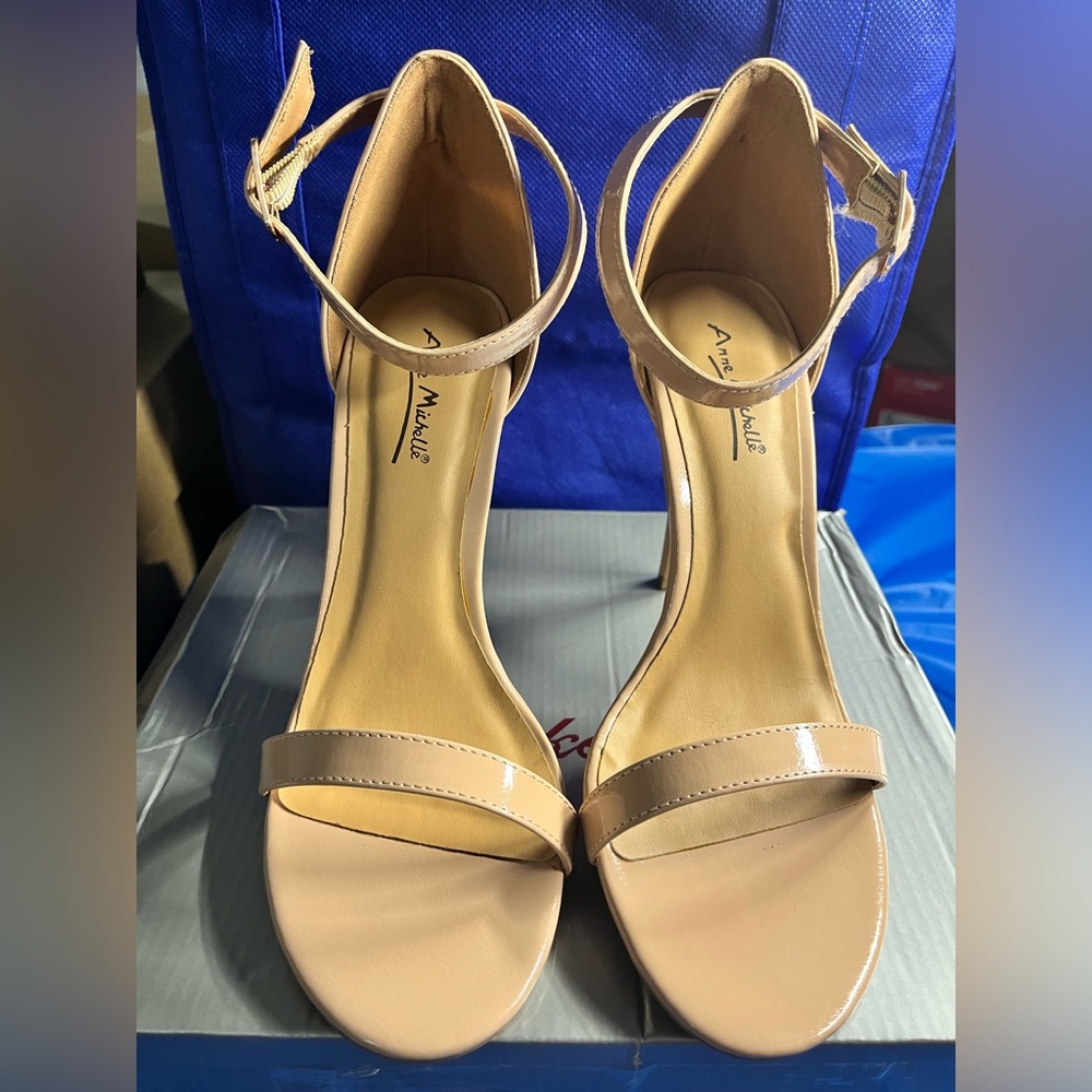 Tan patent leather pumps
